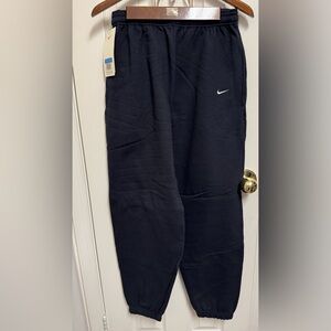 Nike Black Sweatpants with White and Red Logo Tag